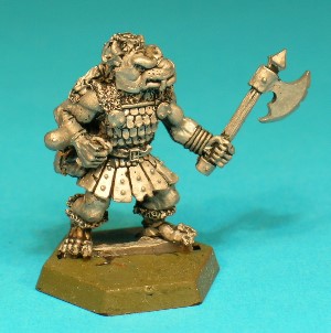 Pose 1, variant C. This variant is bareheaded revealing short mohican-style hair with 2 ponytails. His axe has a notched single blade and top spike. He has a dog-like face with a short muzzle, and a snarling mouth with protruding long upper fangs. He is looking slightly left and has no earrings.