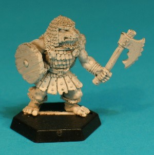 Pose 1, variant D. This Gnoll wears a fine scalemail coif and has a short beard under his chin. His axe is cruelly serrated, with a long, down-curving single blade. He has a dog-like face with a short muzzle, and a closed mouth with protruding long upper fangs. He is looking slightly left and no earrings can be seen.