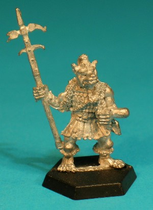 Pose 3, variant C. This variant is bare-headed, revealing a short topknot, and a long beard gathered in a braid. His polearm is a lucerne hammer, with a pair of extra 'unsaddling' hooks below a spike hammer head. The Gnoll has a narrow dog-like face with a short muzzle, and a closed mouth with protruding upper fangs. His head is level and he looks straight forwards and he has no earrings.